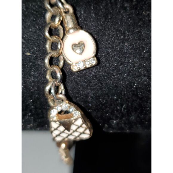 A Guess Women's Charm Bracelet Gold Tone Chain Lipstick Rhinestone - Picture 8 of 11